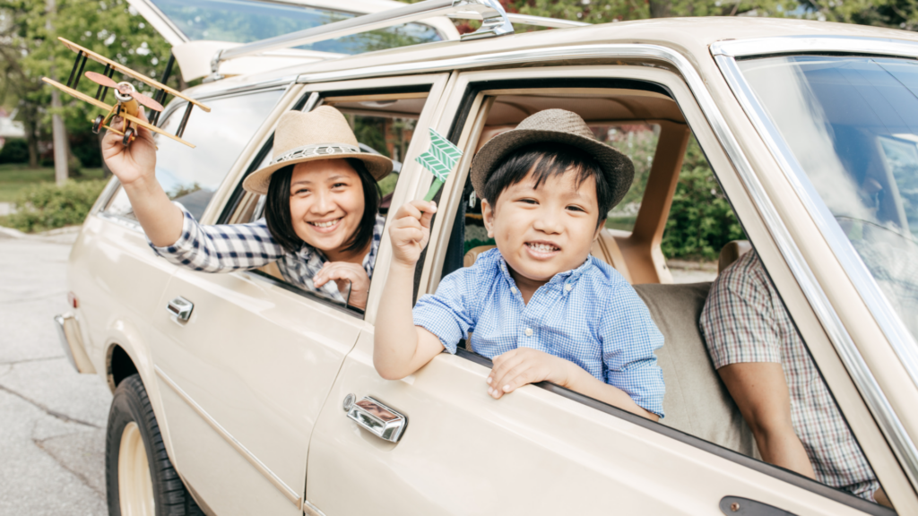 A family getting ready to go on a road trip.